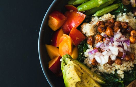 Close up of salad bowl containing high fibre ingredients, including chickpeas and avocado