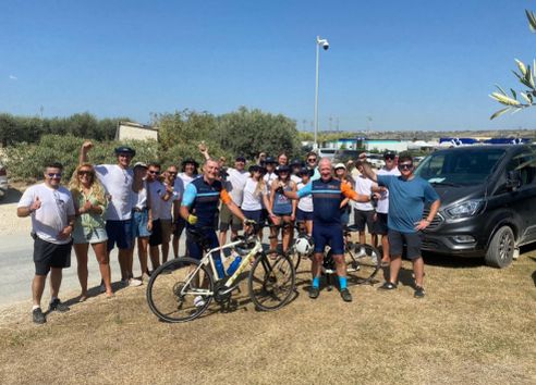 Oynx team photo during cycling fundraiser